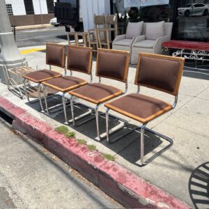 Four Chrome and Wood Chairs Sold